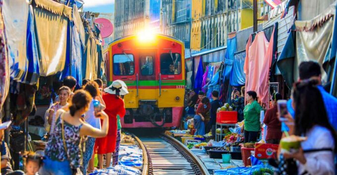 Bangkok: Maeklong Railway & Amphawa Floating Market Day Trip - Frequently Asked Questions
