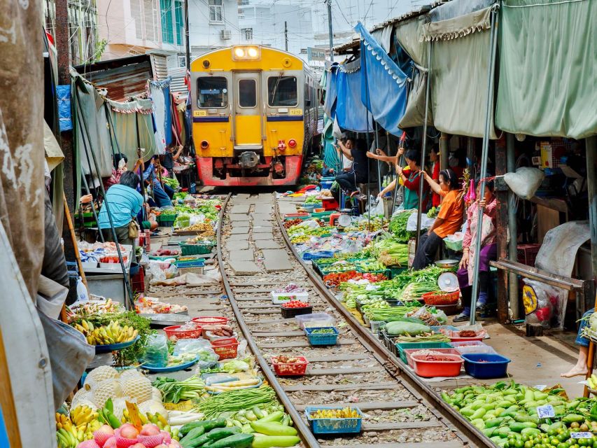 Bangkok: Maeklong Railway & Amphawa Floating Market Day Trip - Frequently Asked Questions