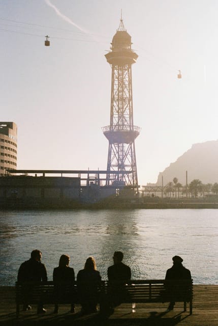 Barcelona by Air and Sea: Montjuic, Cable Car, Beach and Catamaran. - Itinerary Highlights