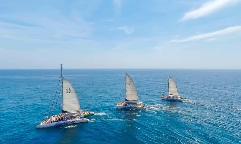 Barcelona: Catamaran Party Cruise with BBQ Meal - An Authentic Barcelona Seaside Experience