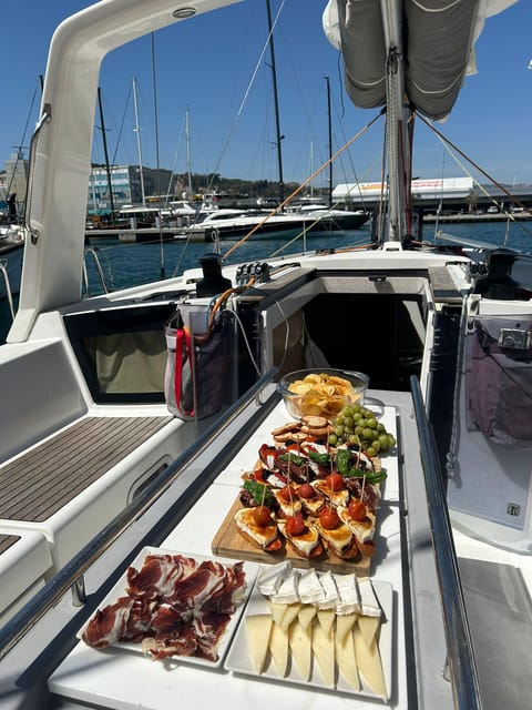 Barcelona: Sailing Tour With Tapas, Drinks and Swim Stop - Boating Activities