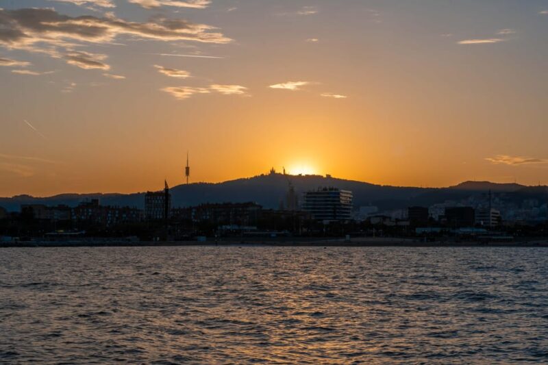 Barcelona: Sunset Catamaran Cruise With Wine and Tapas - Highlights of the Experience