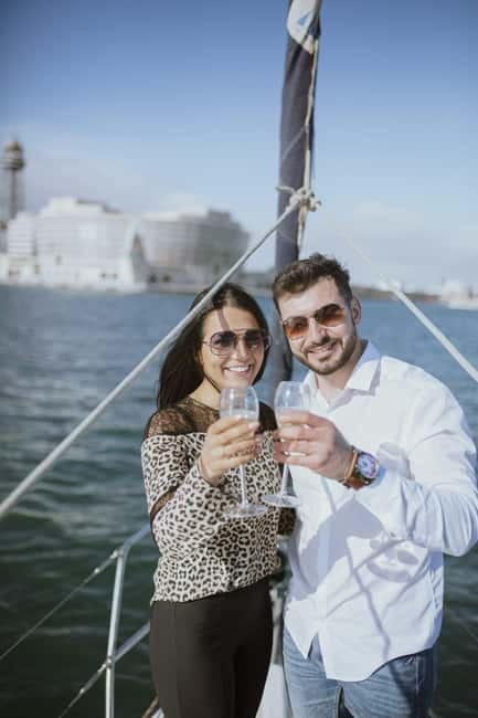 Barcelona: Sunset Sailboat Cruise with Open Bar and Snacks - Key Points