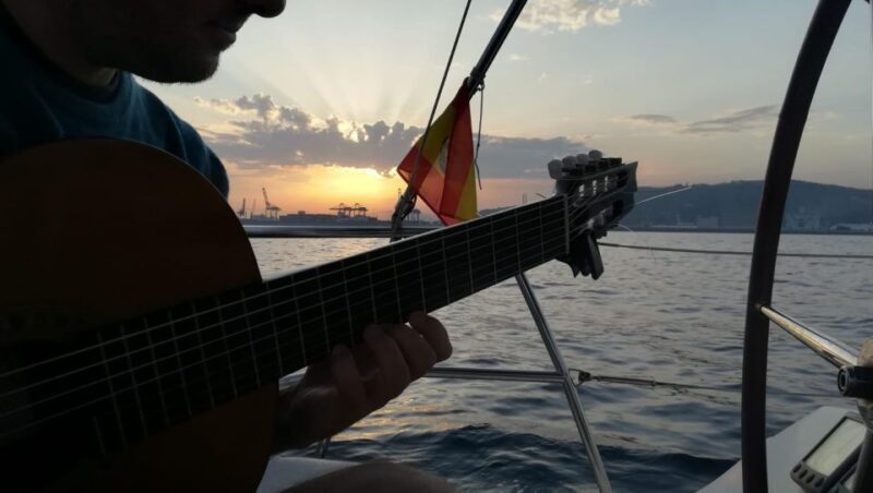 Barcelona: Sunset Sailing With Live Guitar Music and Tapas - Overview of the Sunset Sailing Experience