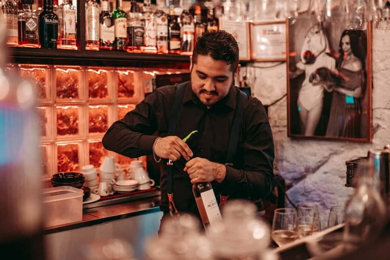 Barcelona: Tipsy Tapas & History Tour in the Gothic Quarter - Venue 2: A Colorful, Historic Bar with Surprises  
