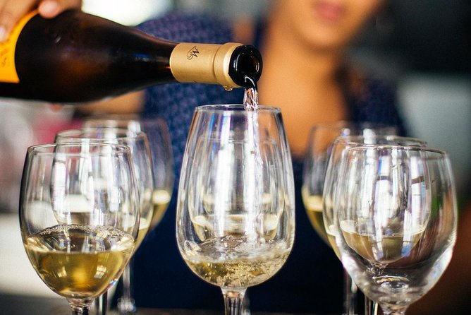 Barcelona With Locals: Wine and Tapas PRIVATE Tour (Bites & Drinks Included) - Culinary and Cultural Insights
