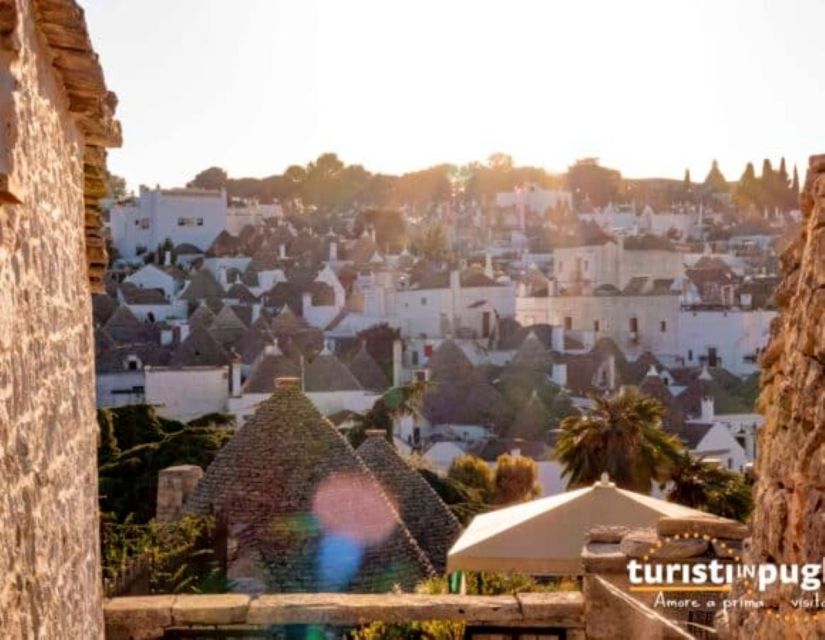Bari: Alberobello and Polignano a Mare Half-Day Trip - Explore Alberobellos Ancient Districts