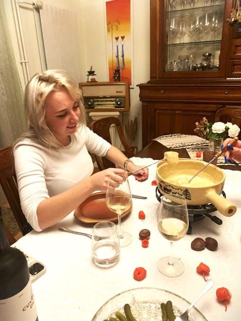Basel: Cheese Fondue, Wine and Dessert Culinary Experience - Warm and Cozy Setting