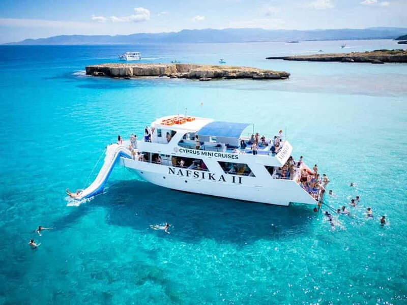 BBQ Boat: Nafsika II Sunset BBQ, Waterslide & Swimming Trip - Key Points
