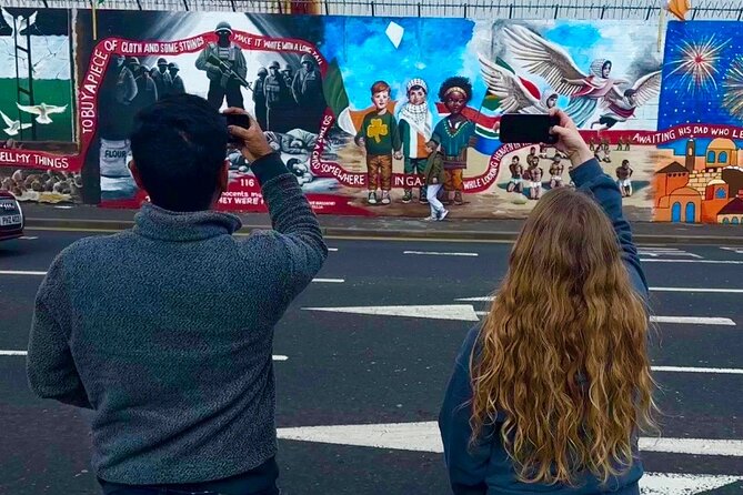 Belfast Black Taxi Tour of Murals and Peace Walls 2 Hours - Insights From a Local Guides Perspective