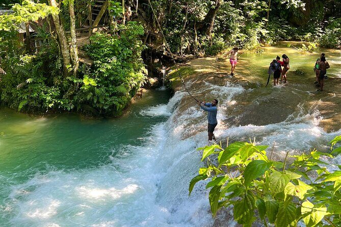 Blue Hole Waterfalls and Bamboo Rafting with Transportation - Who Should Consider This Tour?