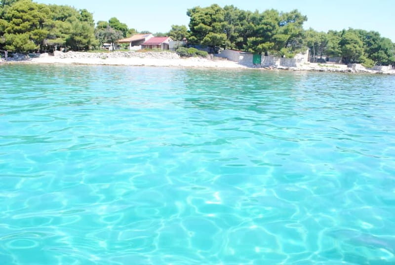 Blue Lagoon and 3 Islands speedboat tour with wine and juice - A Visit to Maslinica: Charm on the Water