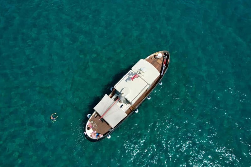 Boat tour Golfo Aranci: Tavolara and Molara Marine Protected Area - Experience the Charm of Sardinia’s Marine Protected Area on a Historic Tugboat