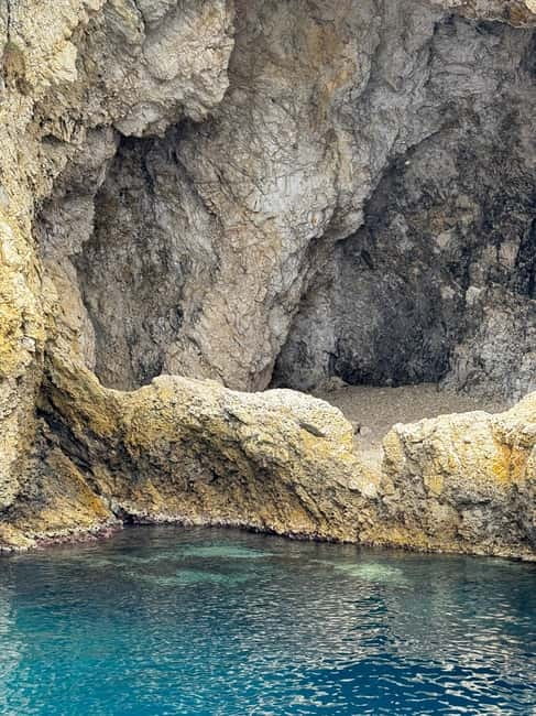 Boat Tour: Grotta dell'Amore - Taormina - Isola Bella - Grotta Azzurra - Sunset and Dolphin Search