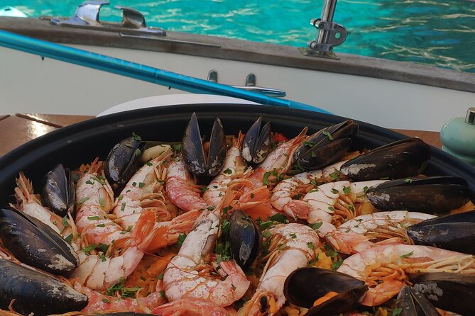 Boat Tour of Palma De Mallorca With Tapas, Drinks and Watertoys - Tapas and Drinks