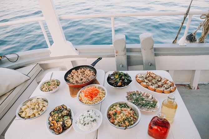 Boat Trip to Anthony Quinn, Kallithea & Traganou Bays - Booking Confirmation and Accessibility