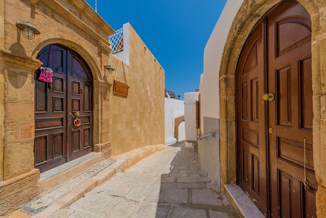 Boat Trip to LINDOS With Swimming Stops at Anthony Quinns & Tsambika Bays - Swimming Stops Highlights