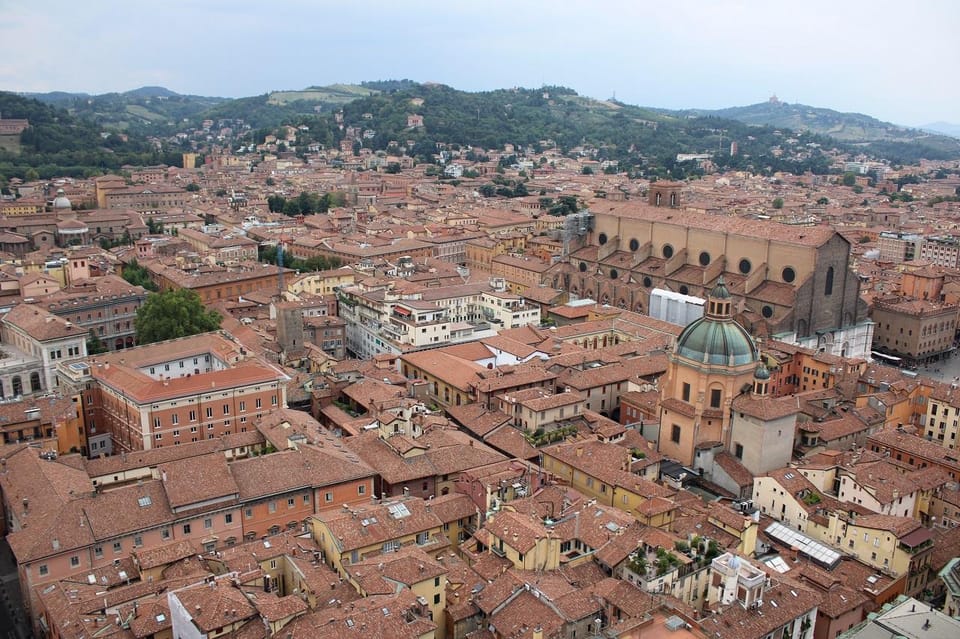 Bologna: Historical Highlights Walking Tour With Local Guide - Tour Overview and Pricing