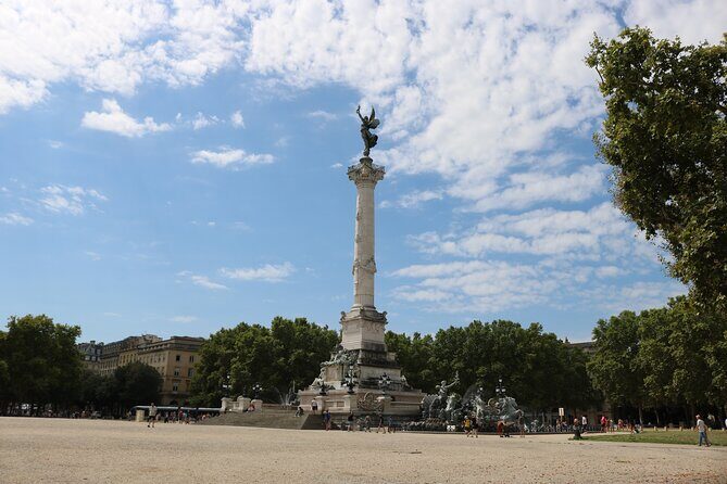 Bordeaux in a Day City and Chateau Visit Shared Walking Tour - Key Points