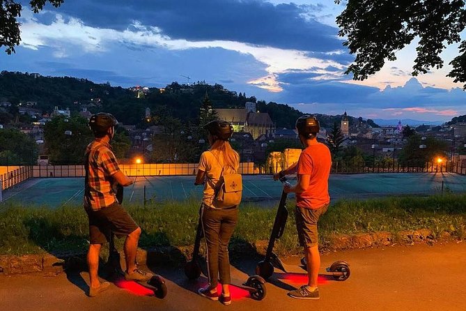 Brasov Old Town Guided Tour With Electric Scooters - Meeting Point and Pickup