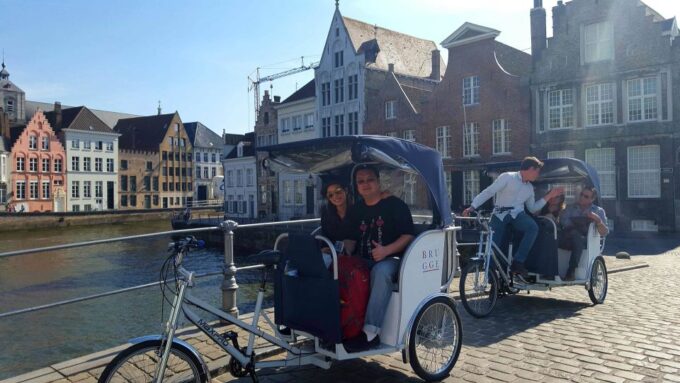 Bruges: Guided Rickshaw Tour - Tour Duration and Pricing
