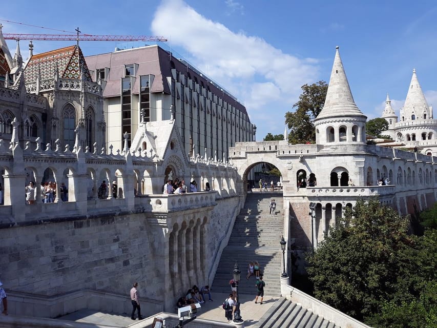 Budapest: Buda Castle Walking Tour & Folk Music Performance - Key Points