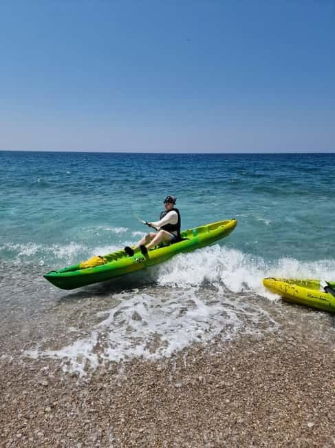 Budva: SUP/kayak tour to Sv.Nikola island caves - The Experience: From Scenic Views to Exciting Jumps