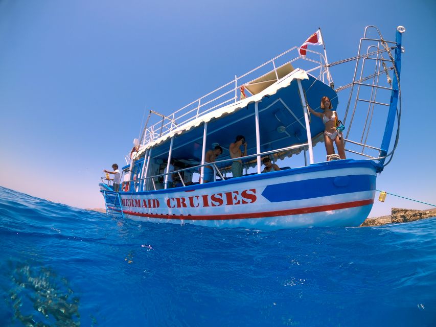 Bugibba: Scenic Sunset Cruise with Blue Lagoon Swim Stop - An Authentic Maltese Boat Experience