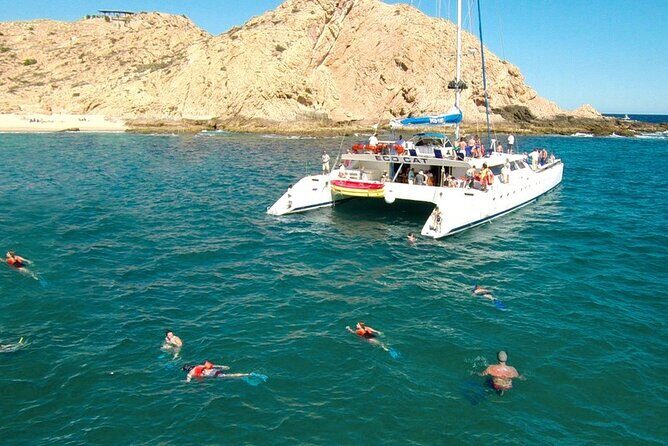 Cabo San Lucas Catamaran: Snorkel, Open Bar & Scenic Cruise - The Sum Up