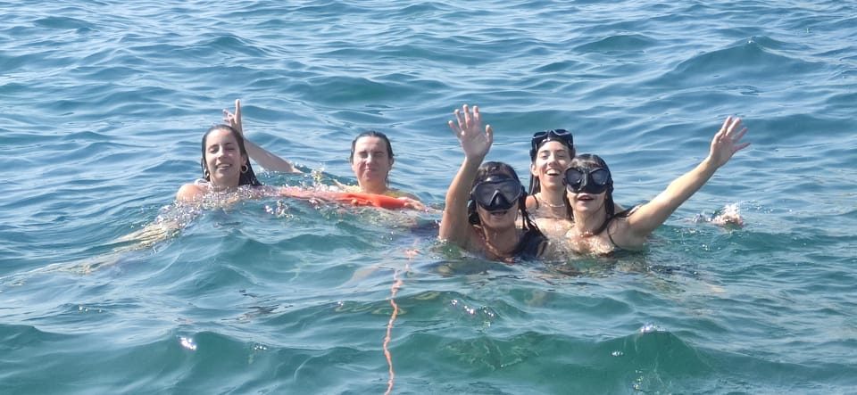Cagliari: Sella Del Diavolo Boat Magic Tour Drink & Snacks - Weather Policy and What to Bring