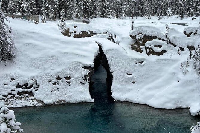 Calgary to Louise, Moraine, Emerald Lake and Johnston Canyon Tour - Natural Bridge: A Quick but Impressive Stop
