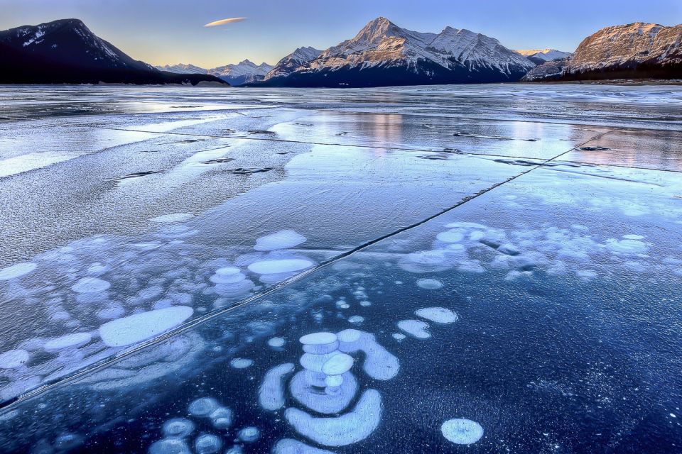 Canadian Rockies: Abraham Lake Ice Bubbles Helicopter Tour - Included Amenities and Gear