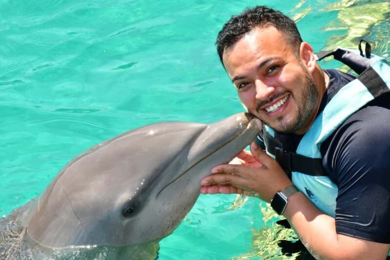 CANCUN: Catamaran and Dolphin Connection at Isla Mujeres - The Dolphin Encounter: A Heartwarming Highlight