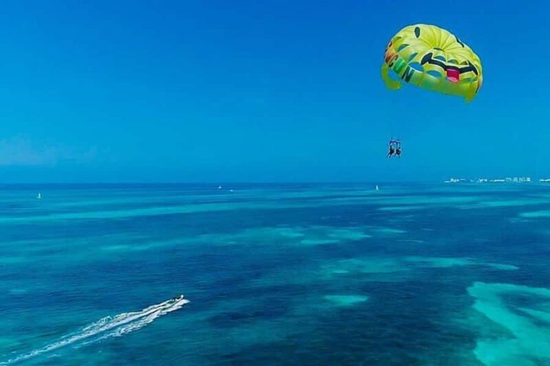 Cancun Combo Tour: 4-Reef Stop Snorkeling and Parasail Ride - Key Points