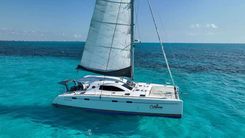 Cancun: Isla Mujeres Catamaran + Coco Bongo Show - Key Points