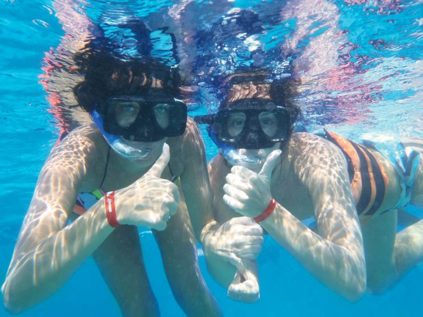 Cancún: Isla Mujeres Catamaran Sailing and Hotel Pick up - Activity Description