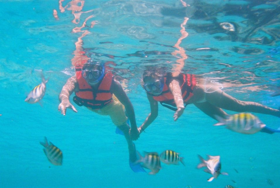 Cancún: Isla Mujeres Catamaran Sailing and Hotel Pick up - Frequently Asked Questions