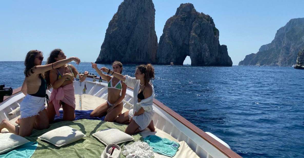 Capri: Island and Grottos Boat Cruise With Snacks and Drinks - Meeting Point and Crew