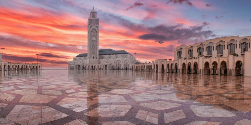 Casablanca Unveiled: Mosque and Urban Exploration - Strolling Along La Corniche Promenade