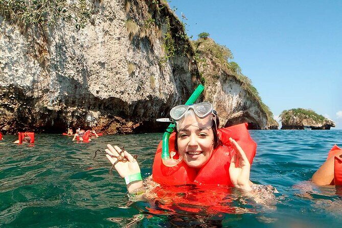 Catamaran Arches, Animas Beach, Quimixed Waterfall and Food Tour - Food and Beverage Experience