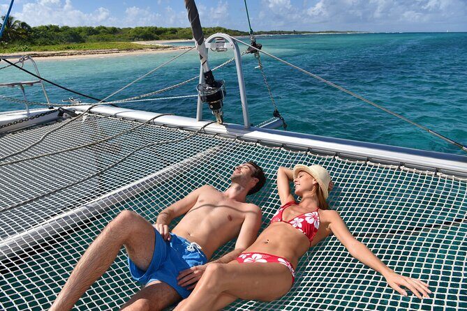 Catamaran Cruise in Riviera Maya With Snorkeling & Beach Club - The Practicalities: Transportation, Duration, and Group Size