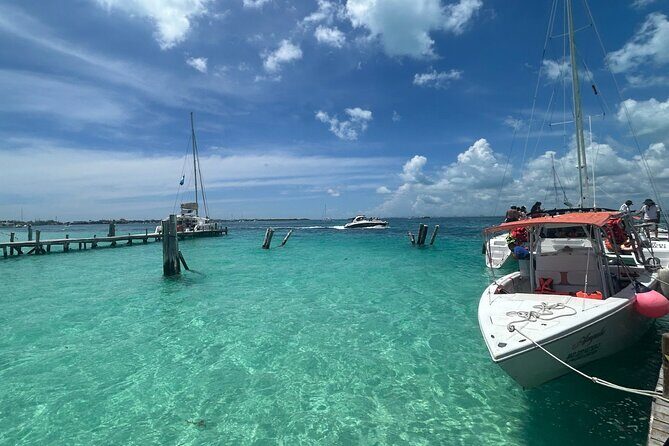 Catamaran Sail with Snorkeling and Beach Club of Isla Mujeres - Practical Tips for Booking and Enjoying Your Day