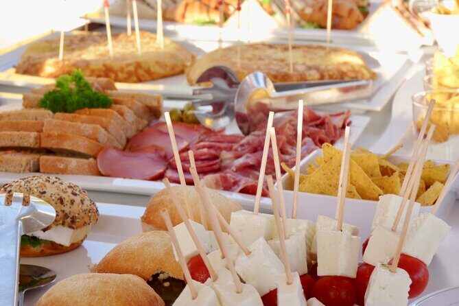 Catamaran sailing at sunset with tapas Palma de Mallorca - A Sunset Catamaran Sail Off Palma de Mallorca: An Authentic Experience