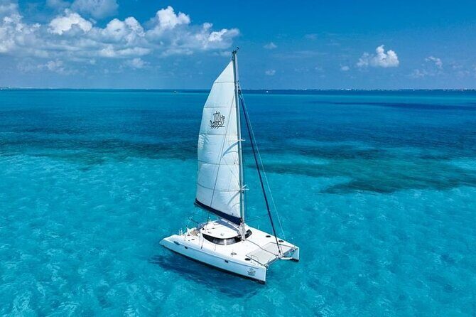 Catamaran sailing Tour to Isla Mujeres all inclusive - Key Points