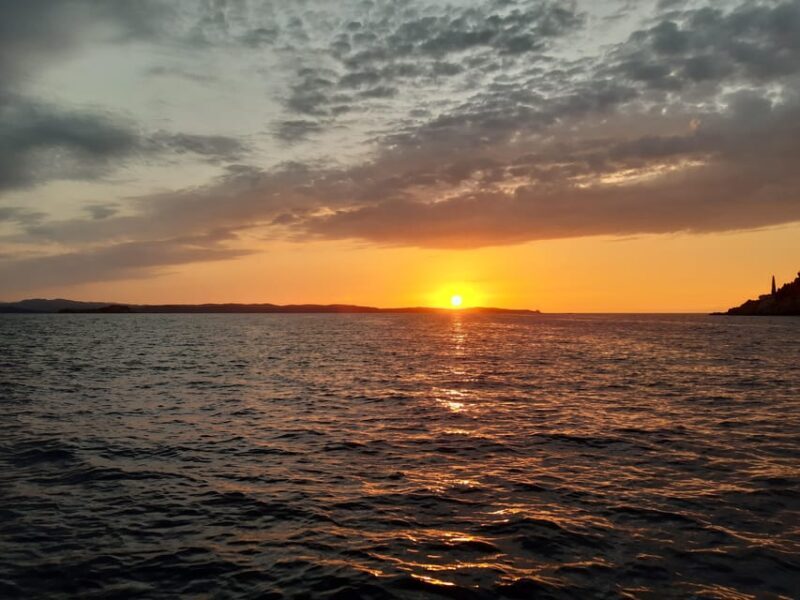 Catamaran Sunset tour La Maddalena Archipelago with aperitif - The Sum Up