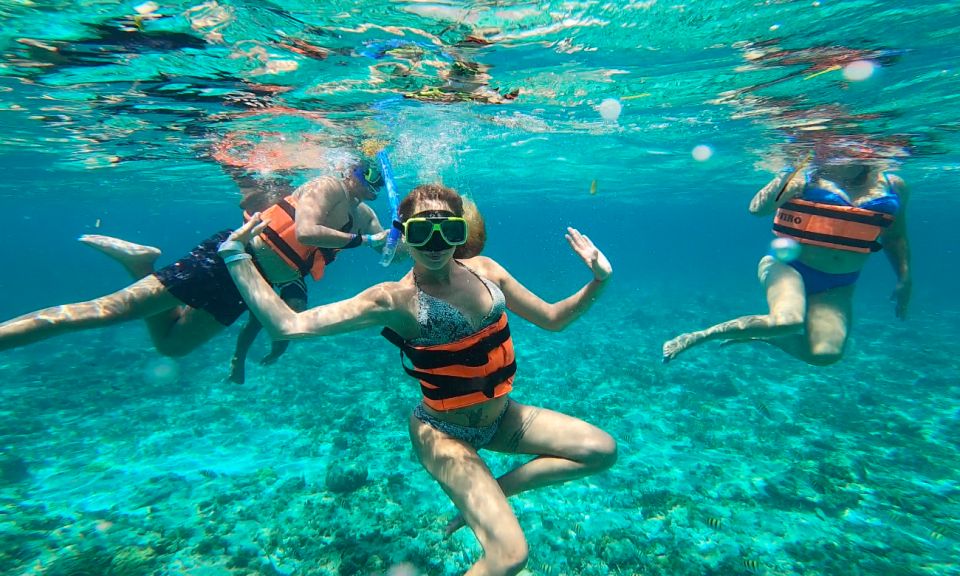 Catamaran to Isla Mujeres, Lunch, Open Bar & Snorkel - Itinerary Breakdown