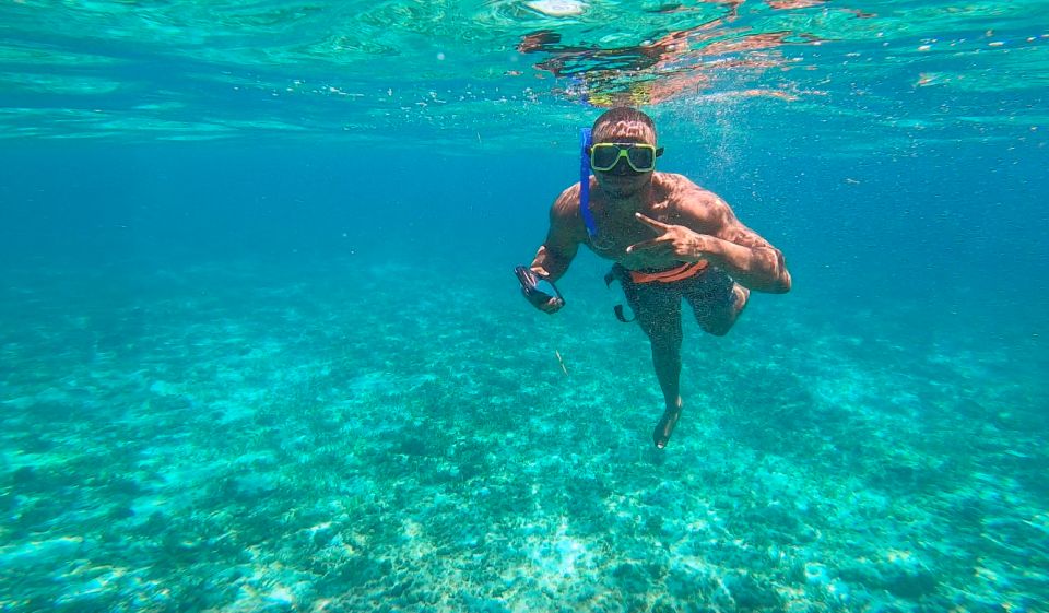 Catamaran to Isla Mujeres, Lunch, Open Bar & Snorkel - Booking Options