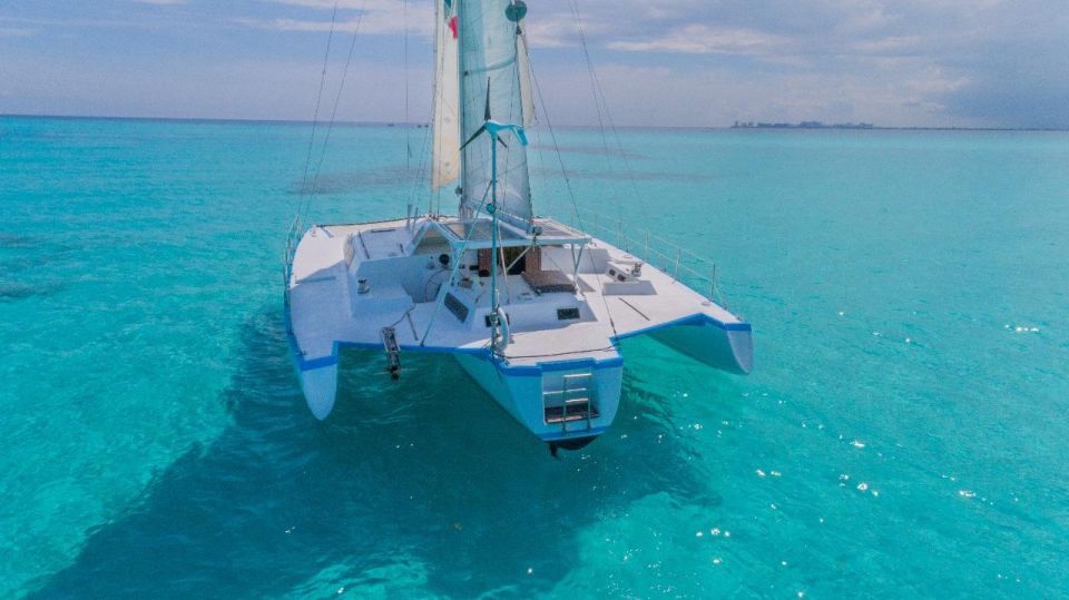 Catamaran to Isla Mujeres, Lunch, Open Bar & Snorkel - Dock Fee