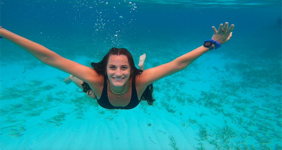 Catamaran to Isla Mujeres, Lunch, Open Bar & Snorkel - Frequently Asked Questions