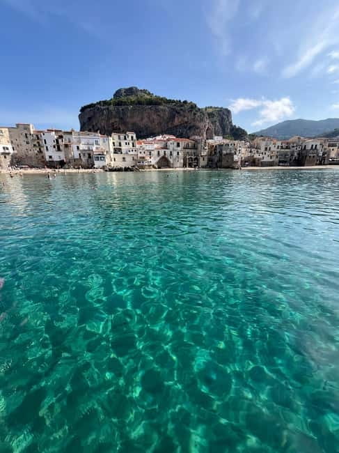Catamaran tour along the Cefalù coast with aperitif and snorkeling - An In-Depth Look at the Cefalù Coast Catamaran Tour